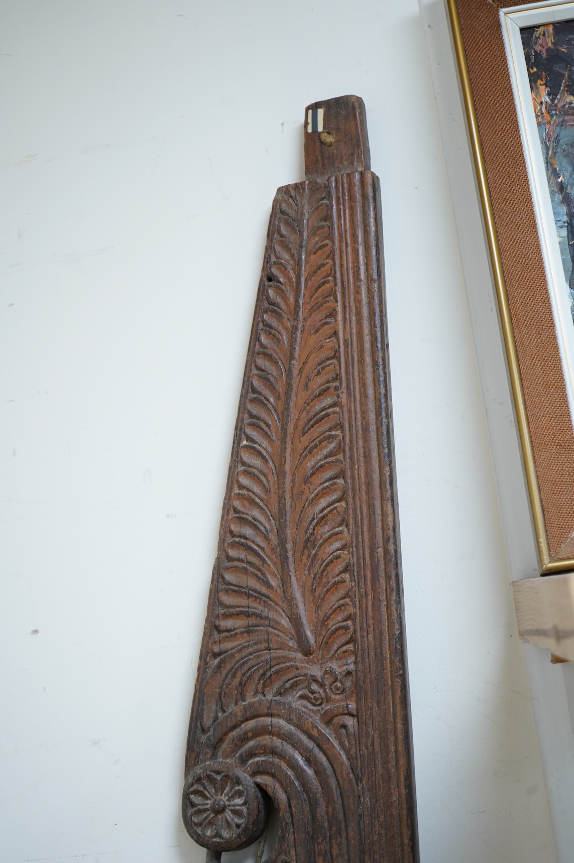 An Anglo-Indian carved wood crest and a similar door portico, latter 127cm in length